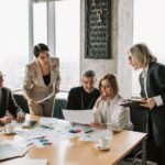 a group of advisors together doing a clients year end planning