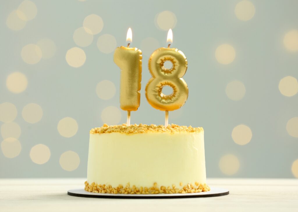 a cake that has 18 candles on it