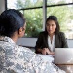 a veteran speaking with her advisor