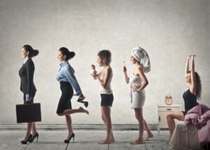 a woman doing her morning routine getting ready for work. you see her in all of the stages of getting ready.