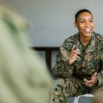 a picture of a veteran in a group talking