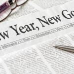 A picture of a newspaper that says new year, new goals