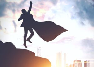 super business person jumping and punching up.