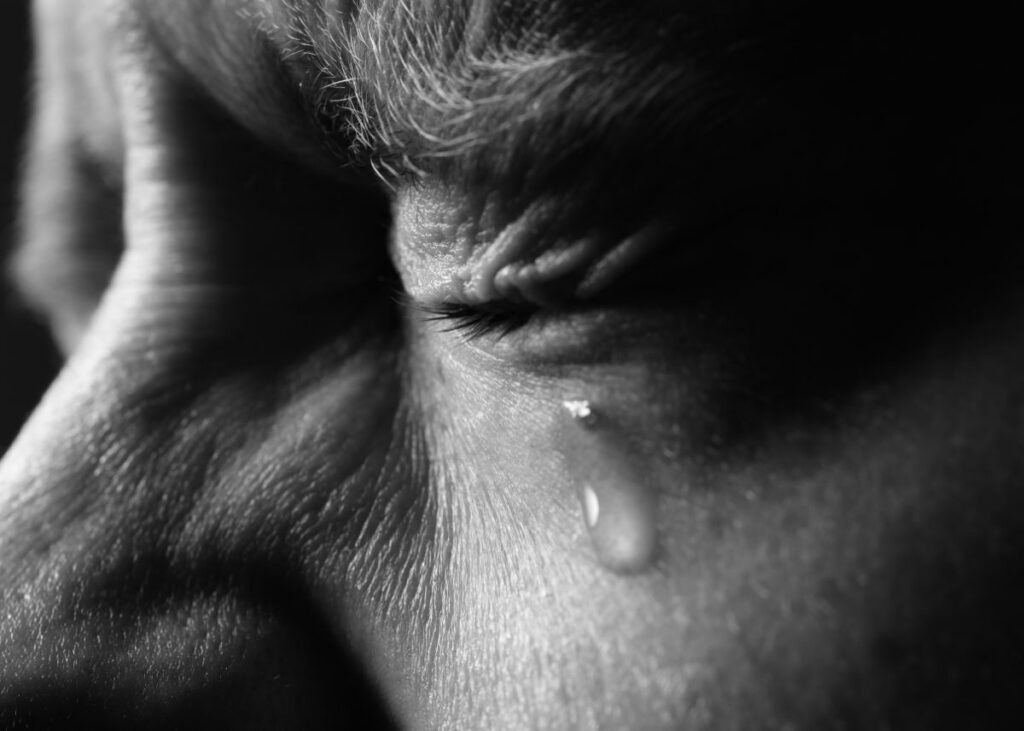 Grief - man crying