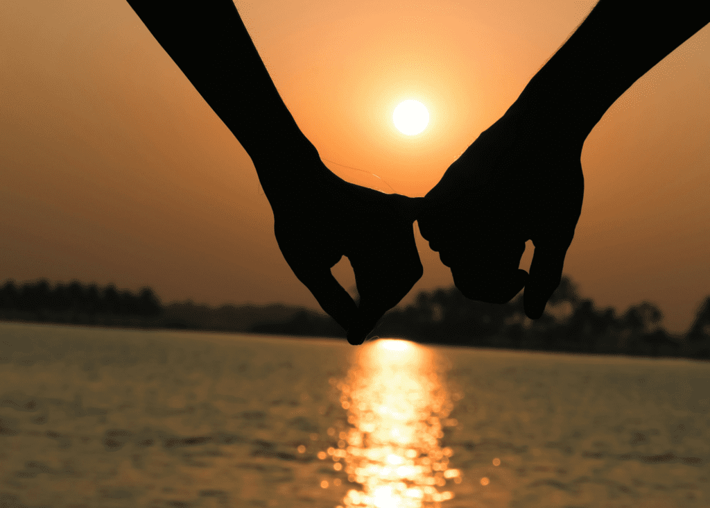 sacred encounter holding hands