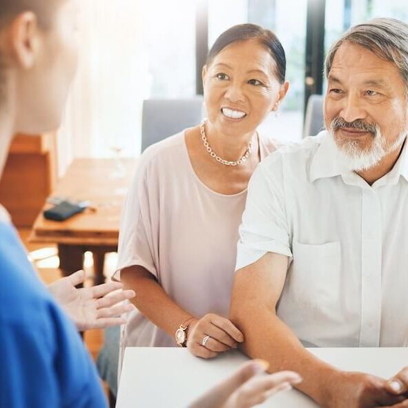 happy senior couple taxing tax advice